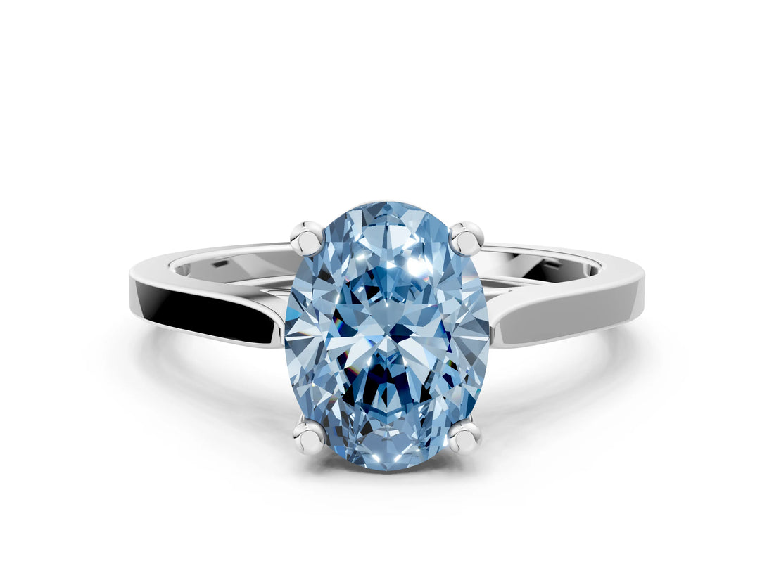 Silver Fancy Blue Oval  Solitaire Diamond Ring with Four-Prong Setting and Tapered Band