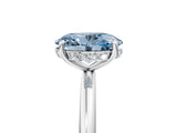 Silver Fancy Blue Oval  Solitaire Diamond Ring with a Classic Band and Four-Prong Setting