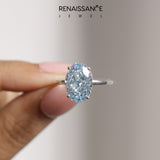 Silver Fancy Blue Oval  Solitaire Engagement Ring with Cathedral Band and Four-Prong Setting_37