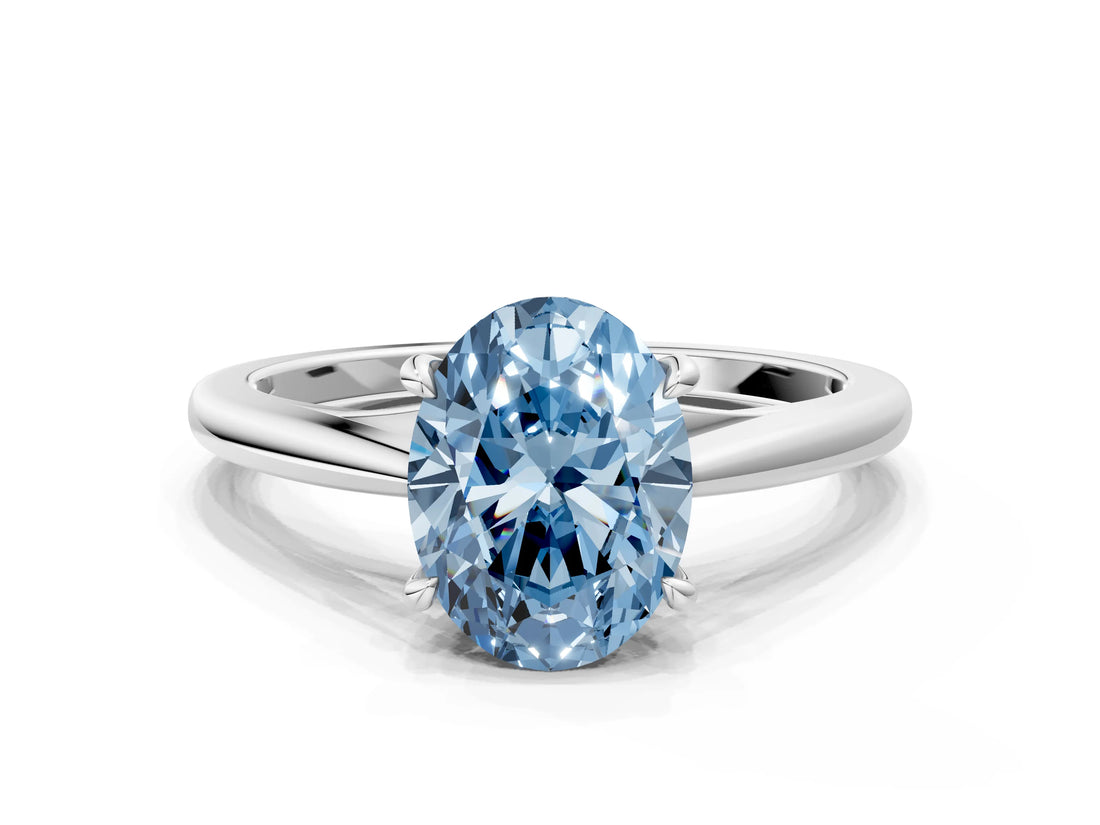 Silver Fancy Blue Oval  Solitaire Engagement Ring with Four-Prong Setting and Classic Band