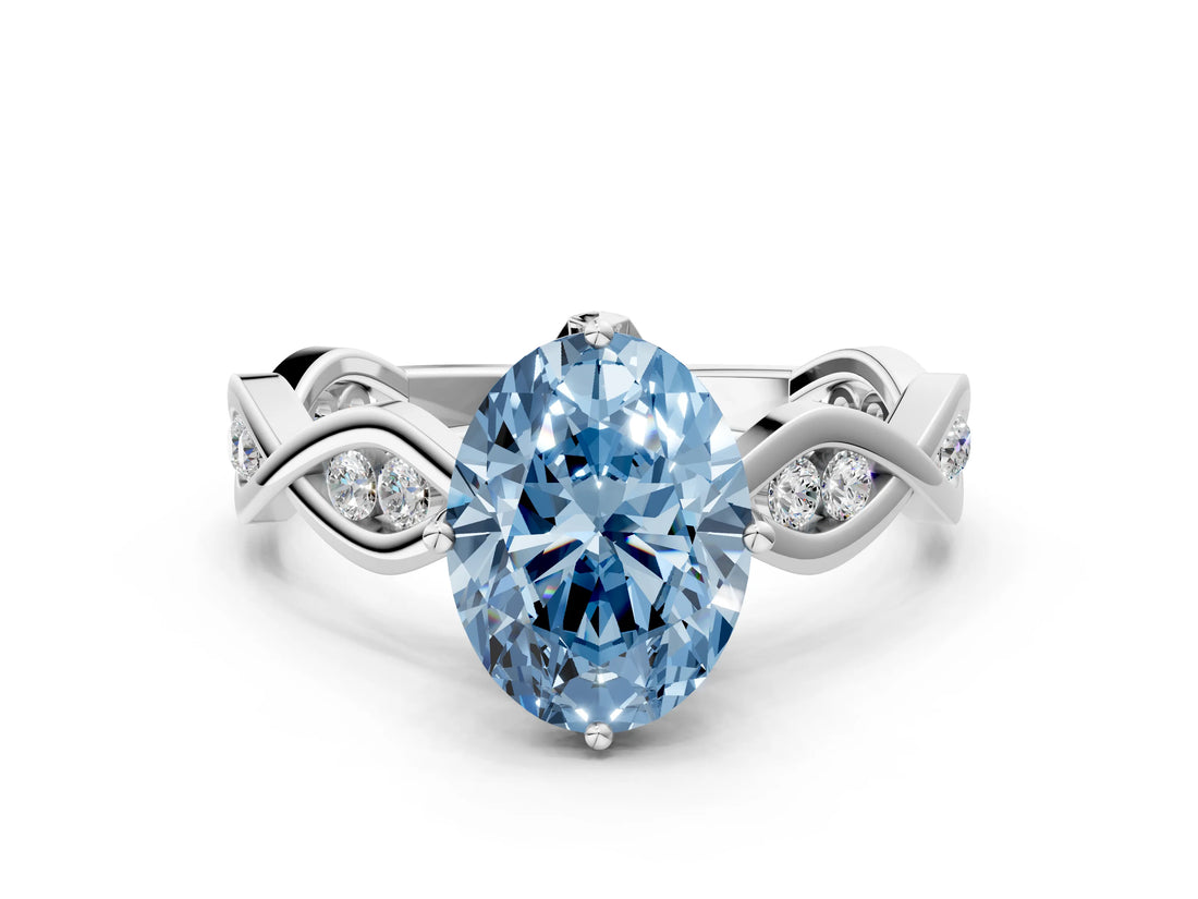Silver Fancy Blue Oval  Solitaire Twist Band with Leaf Prong Setting 1