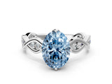Silver Fancy Blue Oval  Solitaire Twist Band with Leaf Prong Setting 1