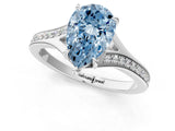 Silver Fancy Blue Pear Cut Diamond Solitaire Ring with Pavé Band and Prong Setting_13
