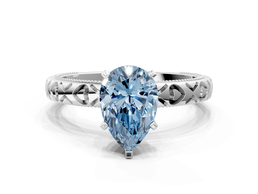 Silver Fancy Blue Pear  Solitaire Diamond Engagement Ring with XO Engraved Band and Four-Prong Setting 1