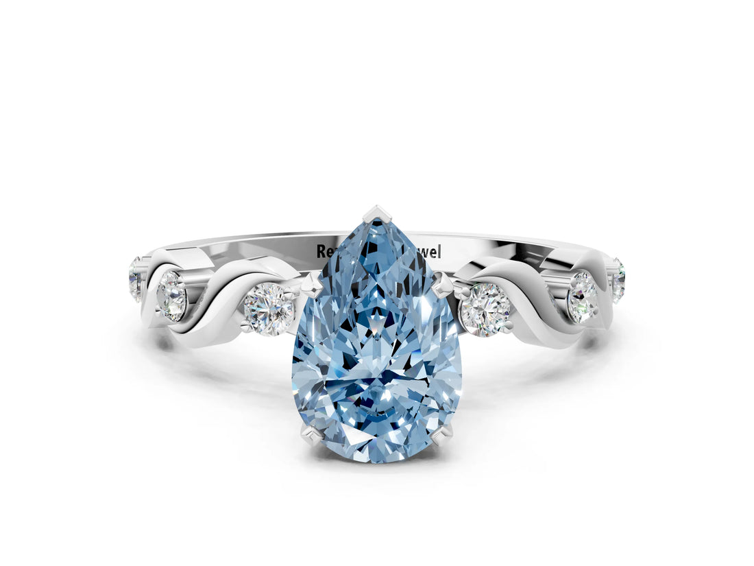 Silver Fancy Blue Pear  Solitaire Twisted Band with Prong Setting