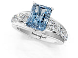 Silver Fancy Blue Radiant  Brilliant Solitaire with Side Stones on a Pave Band and Four-Prong Setting_13