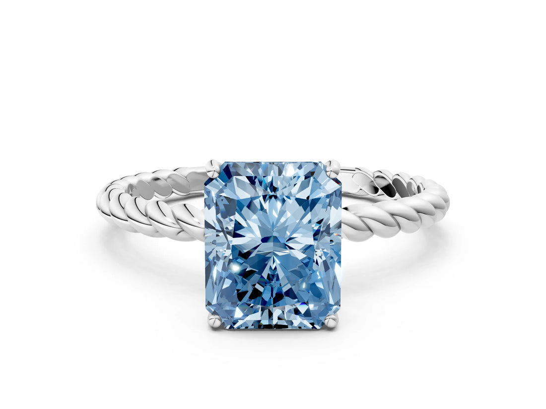 Silver Fancy Blue Radiant  Solitaire Twist Band Ring with Four-Prong Setting