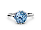 Silver Fancy Blue Round Cut Diamond Solitaire Ring with Flower Prong Setting and Classic Band
