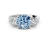 Silver Fancy Blue Round Cut Diamond Three-Stone Engagement Ring with Prong Setting and Pavé Band_6