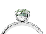 Silver Fancy Green Oval Cut Diamond Pavé Solitaire Ring with Round Band and Prong Setting_4