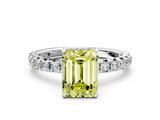 Silver Fancy Yellow Emerald Cut Diamond Pavé Solitaire Ring with Round Band and Prong Setting
