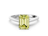 Silver Fancy Yellow Emerald Cut Diamond Solitaire Engagement Ring with Cathedral Setting and Four-Prong Mount