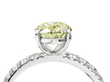 Silver Fancy Yellow Oval Cut Diamond Pavé Solitaire Ring with Round Band and Prong Setting_4
