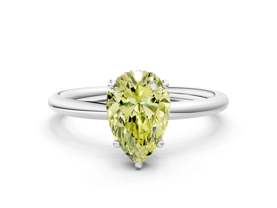 Silver Fancy Yellow Pear  Solitaire Diamond Ring with a Classic Band and Four-Prong Setting 1