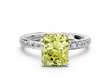Silver Fancy Yellow Radiant  Cut Diamond Solitaire with Pave Band and Four-Prong Setting
