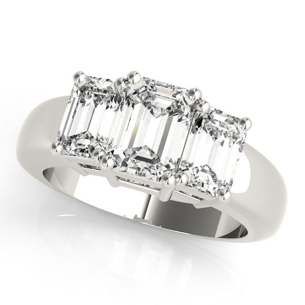 Silver Four-Stone Radiant Cut Diamond Ring with Prong Setting on a Silver Band