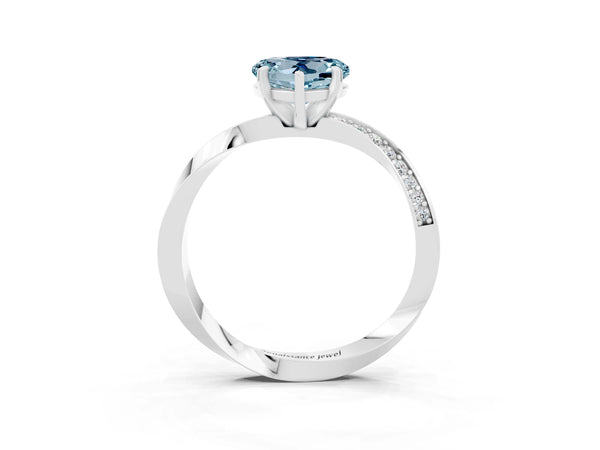 Silver Heart Cut Aquamarine Engagement Ring with Side Stone Accents and Four-Prong Setting