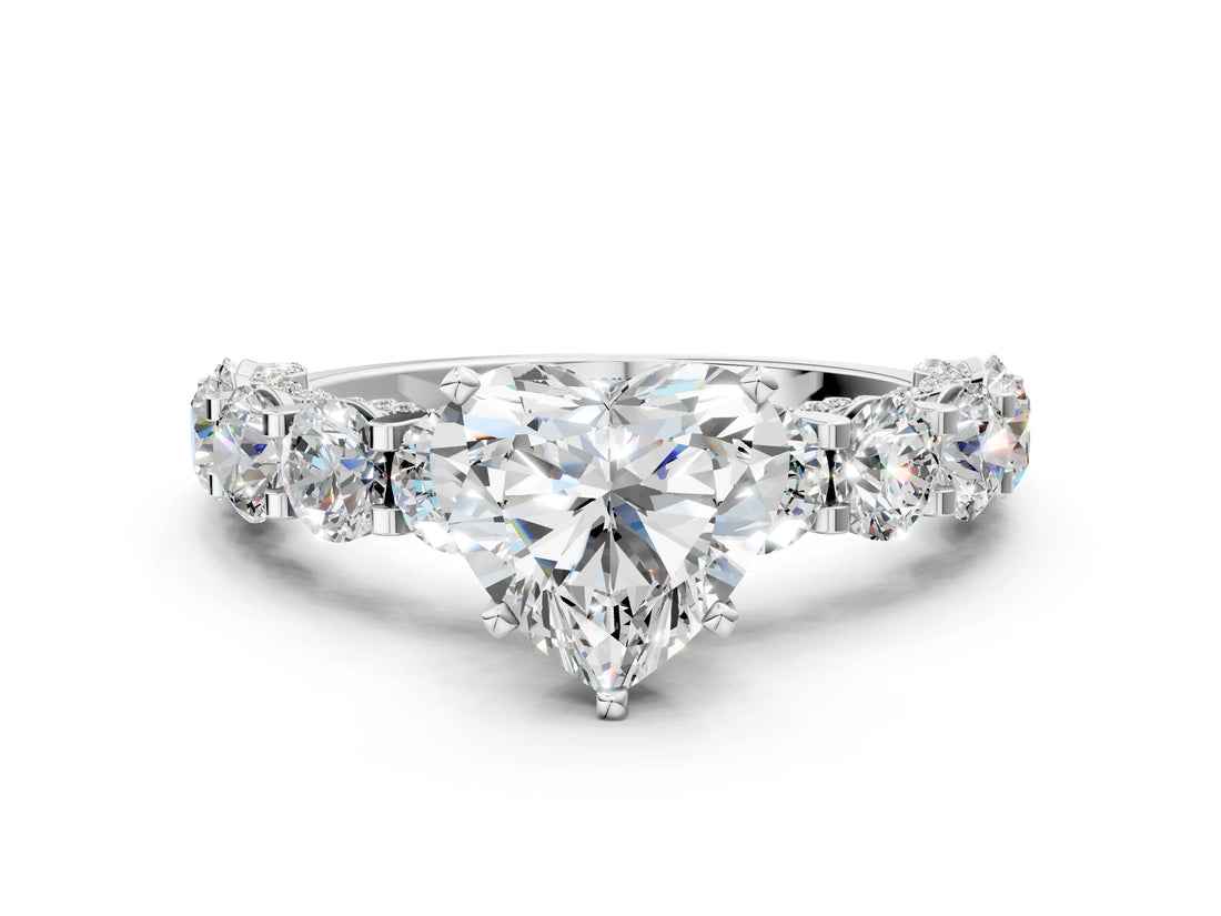 Silver Heart Cut Diamond Side Stone Engagement Ring with Four-Prong Setting