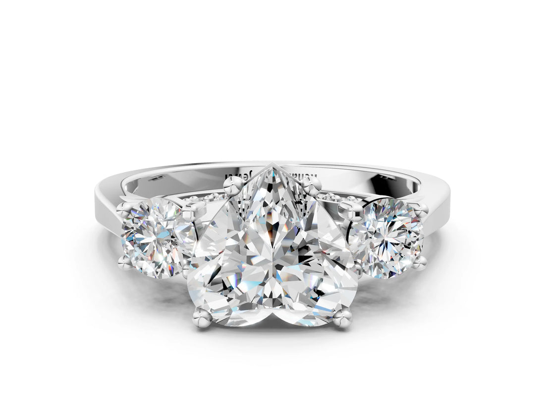 Silver Heart Cut Diamond Three-Stone Engagement Ring with Prong Setting and Pavé Band_31