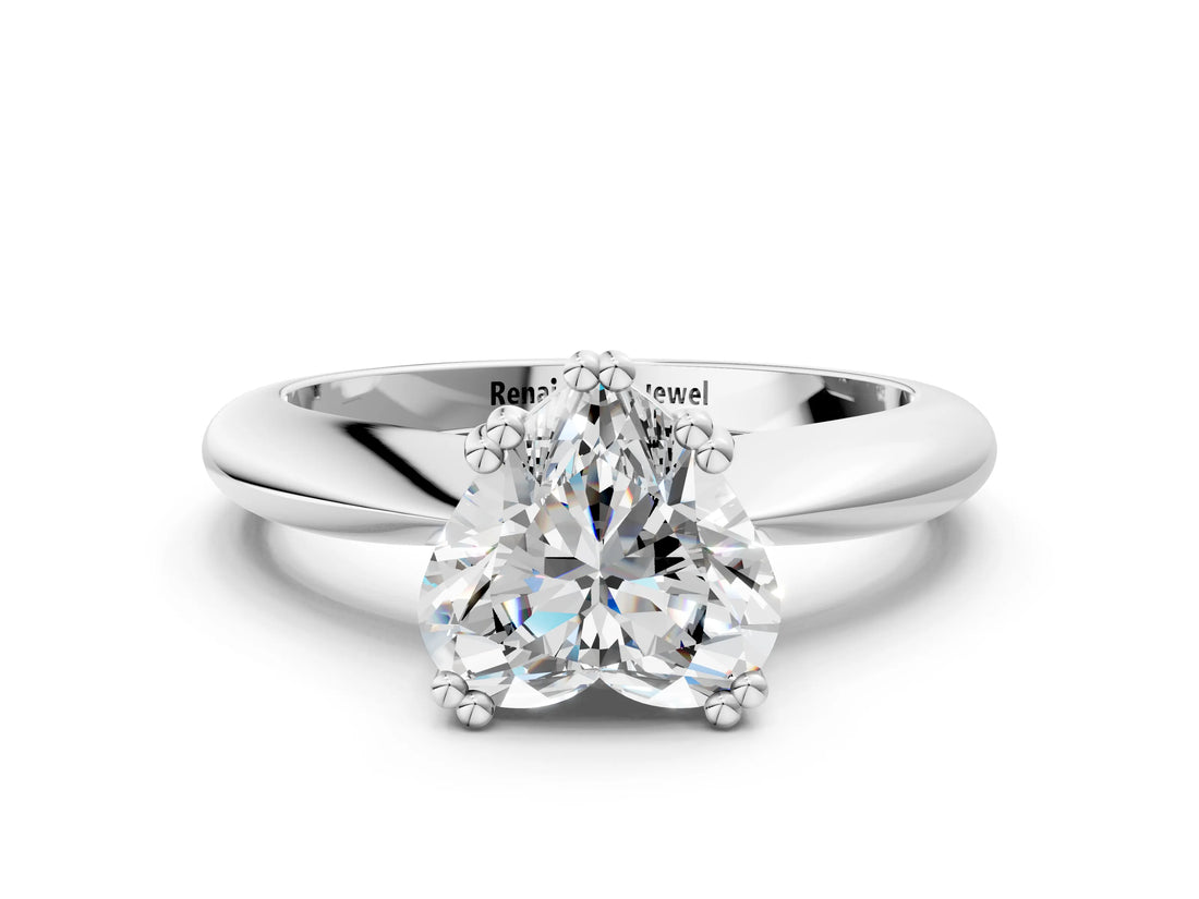 Silver Heart Cut Solitaire Engagement Ring with Tapered Band and Four-Prong Setting