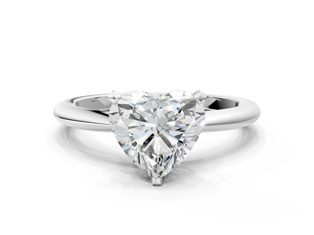 Silver Heart Solitaire Diamond Ring with Six-Prong Setting on a Classic Band