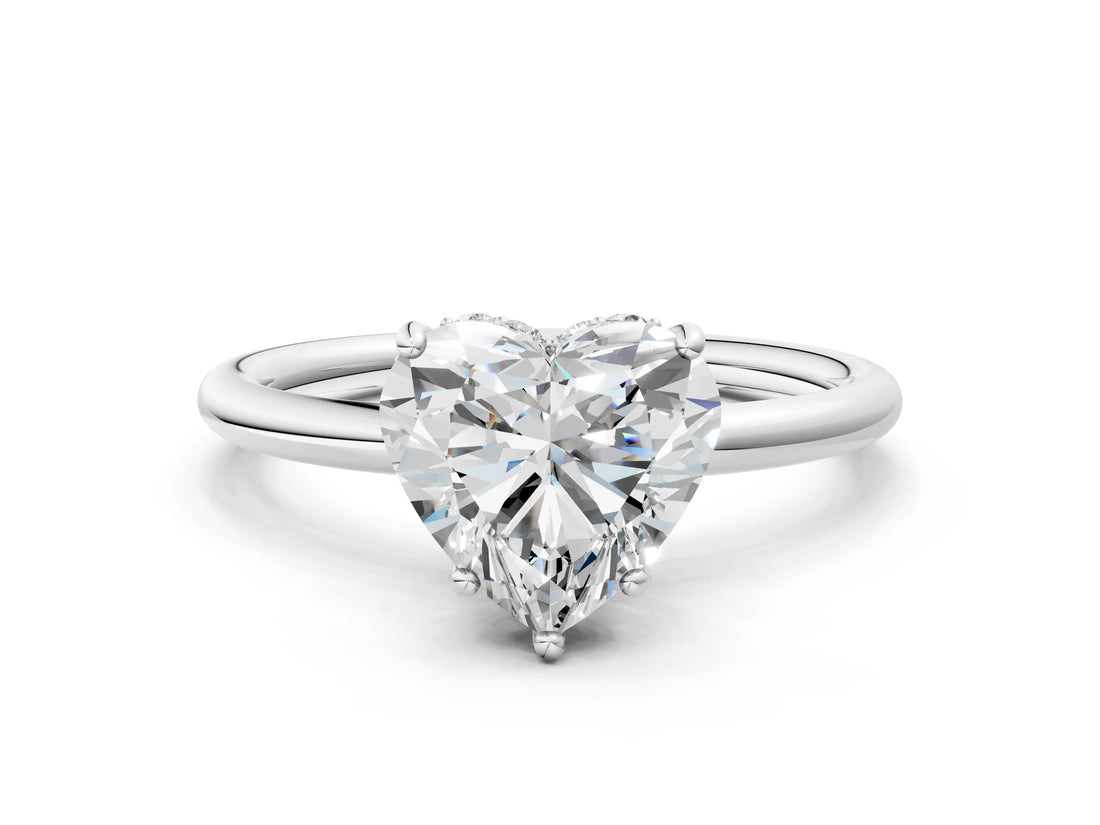 Silver Heart Solitaire Diamond Ring with a Classic Band and Four-Prong Setting