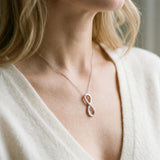 Silver Infinity Pendant with Round Brilliant Diamonds in Pavé Setting_34