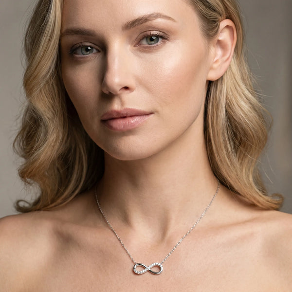 Silver Infinity Pendant with Round Brilliant Diamonds in Pavé Setting