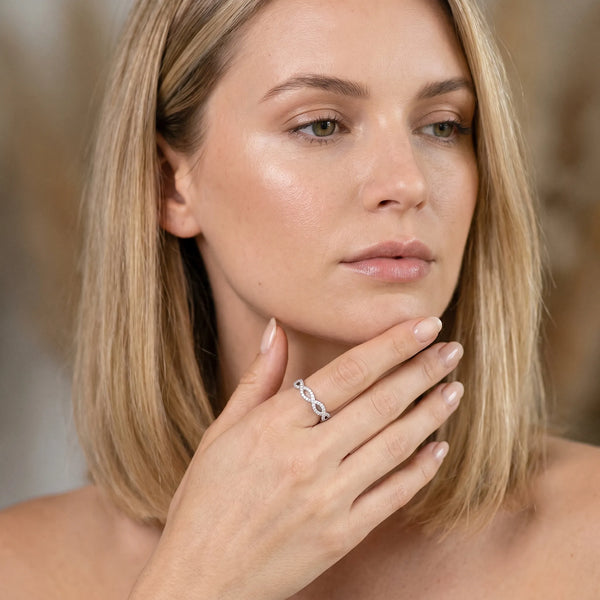 Platinum Infinity Twist Diamond Pavé Band with Round Stones and Prong Setting