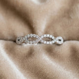 Silver Infinity Twist Diamond Pavé Band with Round Stones and Prong Setting_15