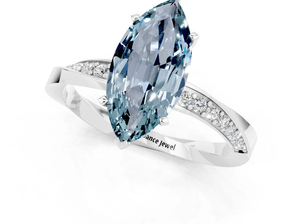 Silver Marquise Cut Aquamarine Engagement Ring with Side Stone Accents and Four-Prong Setting