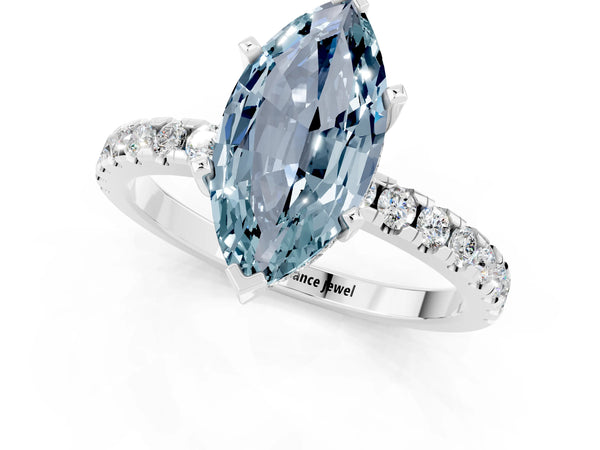 Silver Marquise Cut Aquamarine Solitaire Ring with Round Pavé Band and Four-Prong Setting