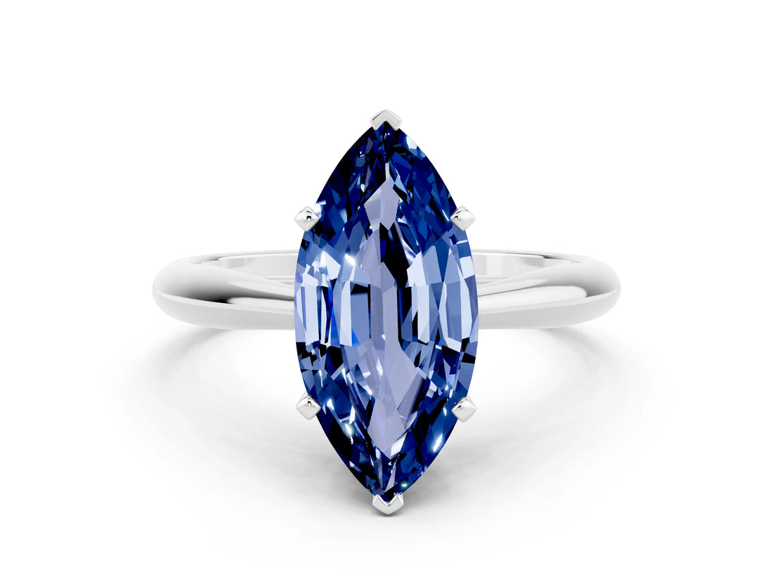 Silver Marquise Cut Blue Sapphire Solitaire Engagement Ring with Cathedral Setting and Four-Prong Mount
