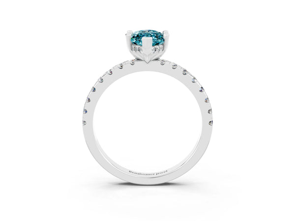 Silver Marquise Cut Blue Topaz Solitaire Ring with Round Pavé Band and Four-Prong Setting