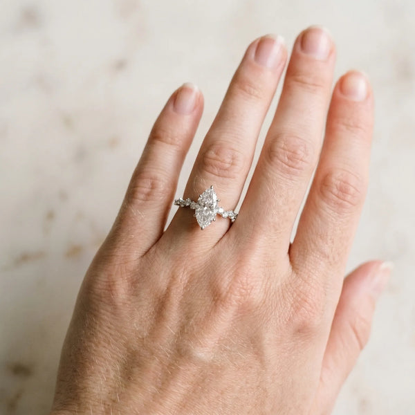 Silver 0.53 Carat E VVS2 Marquise Diamond Cluster Side Stone Solitaire Ring with Prong Setting