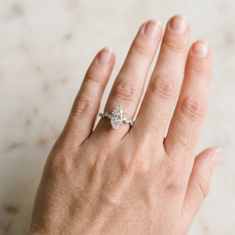 Silver 0.50 Carat D VVS2 Marquise Diamond Cluster Side Stone Solitaire Ring with Prong Setting