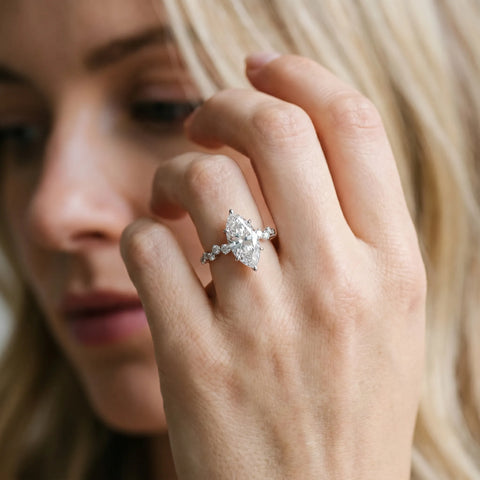 Silver 0.50 Carat D VVS2 Marquise Diamond Cluster Side Stone Solitaire Ring with Prong Setting