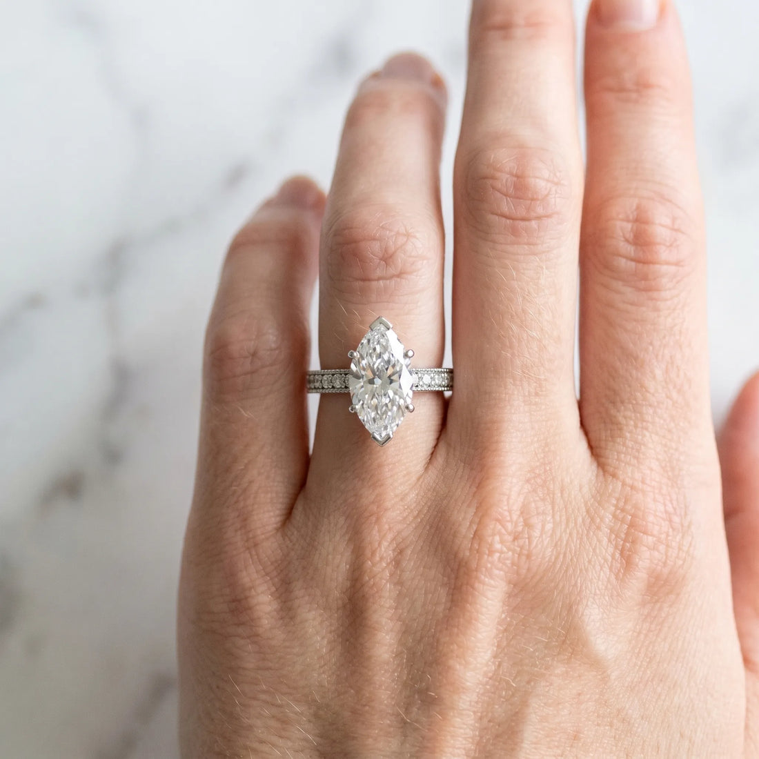 Silver Marquise Cut Diamond Milgrain Pavé Engagement Ring with Four-Prong Setting_147