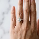 Silver Marquise Cut Diamond Ring with Side Stones and Four-Prong Setting_141