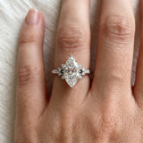 Silver Marquise Cut Diamond Ring with Side Stones and Four-Prong Setting_144