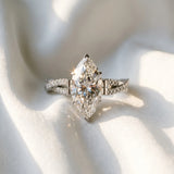 Silver Marquise Cut Diamond Solitaire Engagement Ring with Twisted Pavé Band and Four-Prong Setting_83