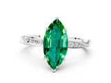Silver Marquise Cut Emerald Engagement Ring with Side Stone Accents and Four-Prong Setting_24