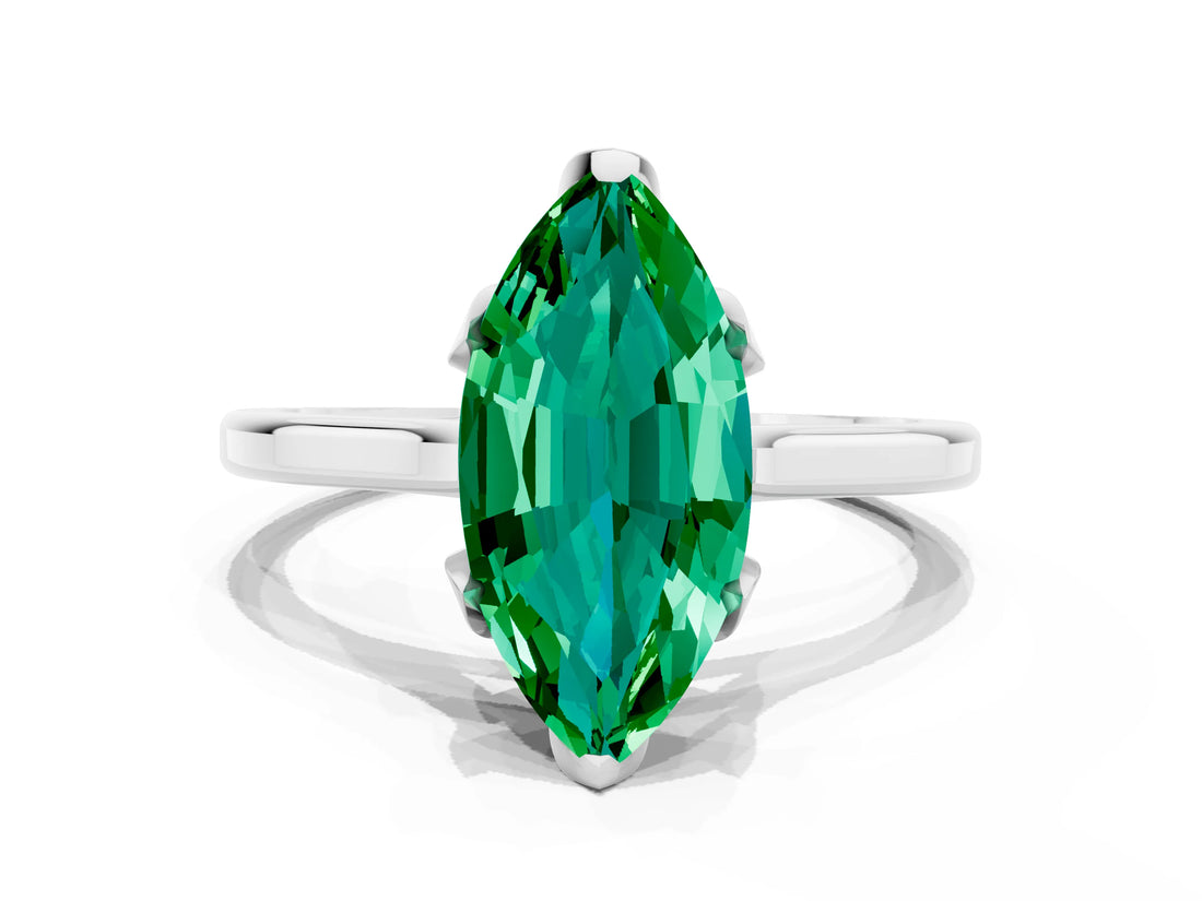 Silver Marquise Cut Emerald Solitaire Ring with Flower Prong Setting and Classic Band