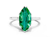 Silver Marquise Cut Emerald Solitaire Ring with Flower Prong Setting and Classic Band