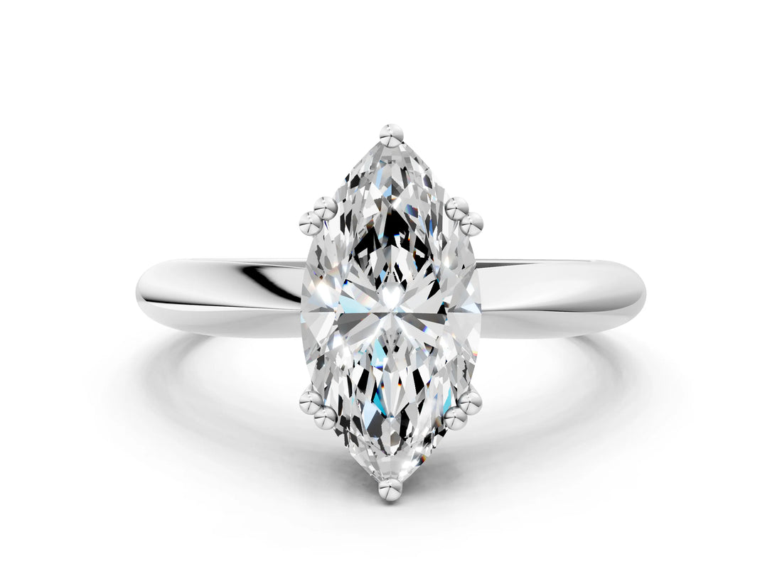 Silver Marquise Cut Solitaire Engagement Ring with Tapered Band and Four-Prong Setting