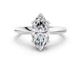 Silver Marquise Cut Solitaire Engagement Ring with Tapered Band and Four-Prong Setting