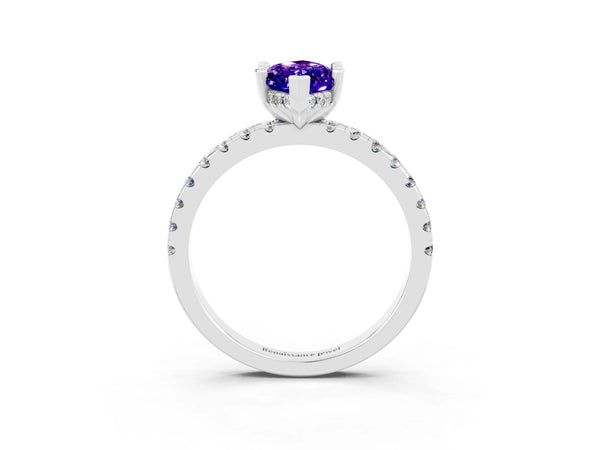 Silver Marquise Cut Tanzanite Solitaire Ring with Round Pavé Band and Four-Prong Setting