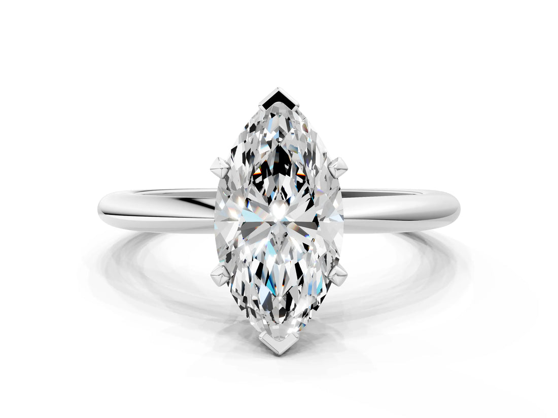 Silver Marquise Solitaire Diamond Ring with Six-Prong Setting on a Classic Band
