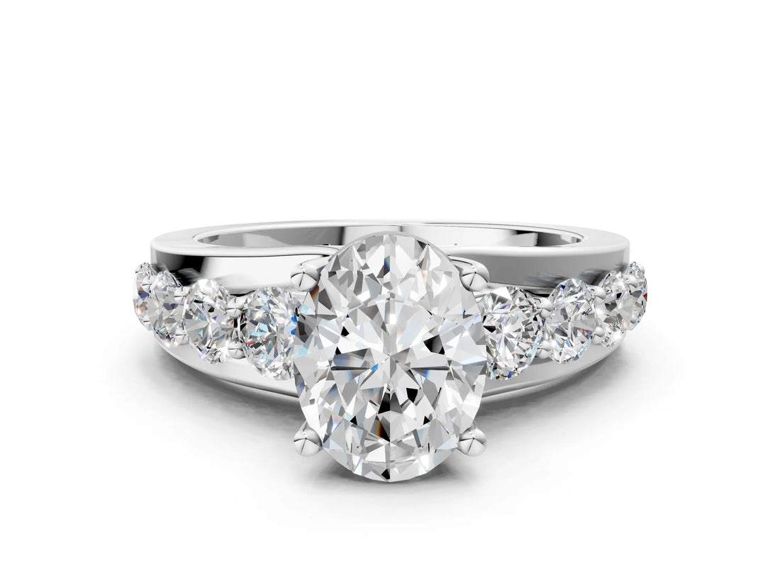 Silver Oval Brilliant Solitaire with Side Stones on a Pave Band and Four-Prong Setting_14