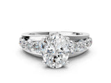 Silver Oval Brilliant Solitaire with Side Stones on a Pave Band and Four-Prong Setting_14